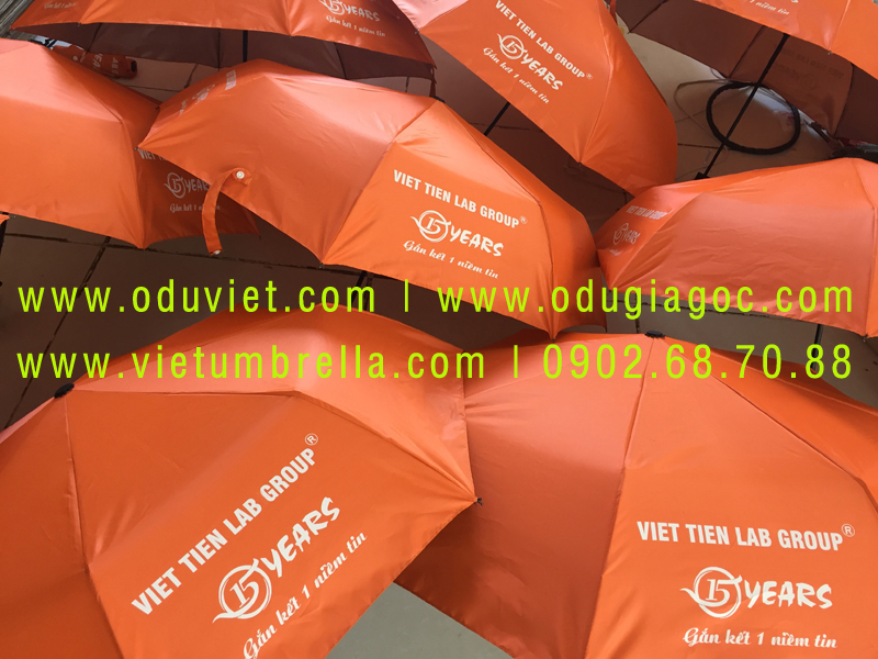 xưởng sản xuất ô dù cầm tay in logo quảng cáo